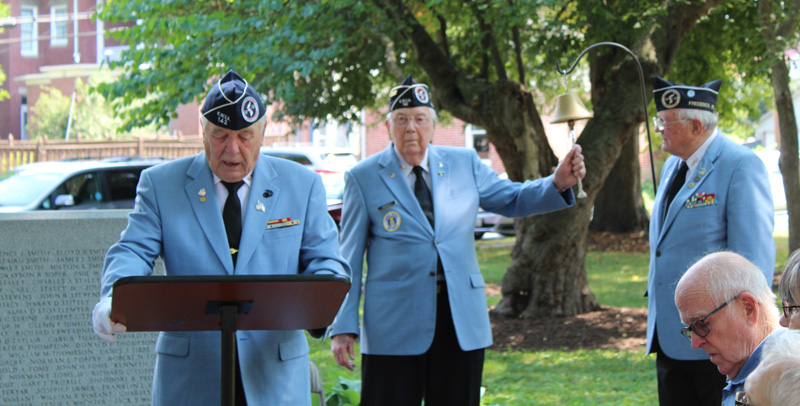 Commander Becker reads names