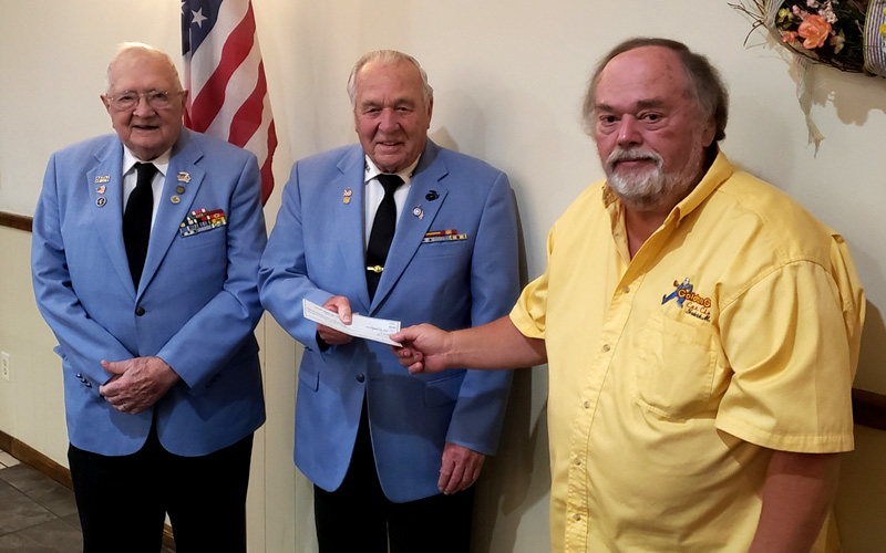 Golden Gears Car Club present check to Chapter 142